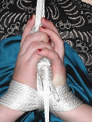 Blond milf hogtied on the..